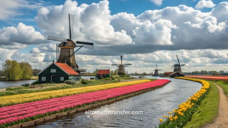 خريطة توضّح المسافة والوقت بين النمسا وهولندا: فيينا–أمستردام ≈ 1,100–1,200 كم (11–13 س بالسيارة؛ القطار ≈ 11–13 س؛ الطيران ≈ 1:50–2:10 س)، سالزبورغ–أمستردام ≈ 950–1,000 كم (9–11 س)، إنسبروك–أمستردام ≈ 900–950 كم (9–10.5 س)، لينتس–روتردام ≈ 1,000–1,050 كم (10–11.5 س)